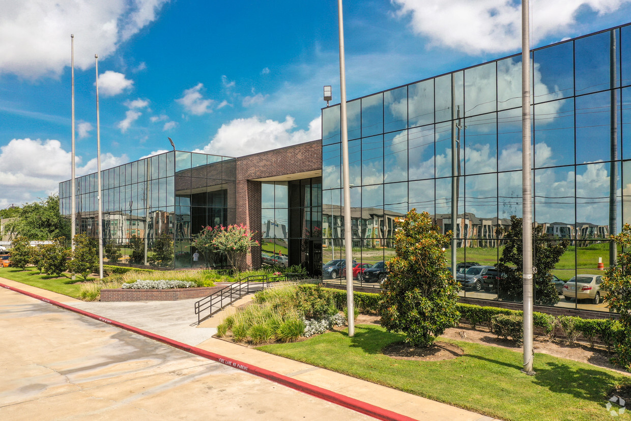 Exterior of the 11104 West Airport Blvd office building in Stafford, Texas
